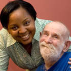 Photograph of a patient and helper