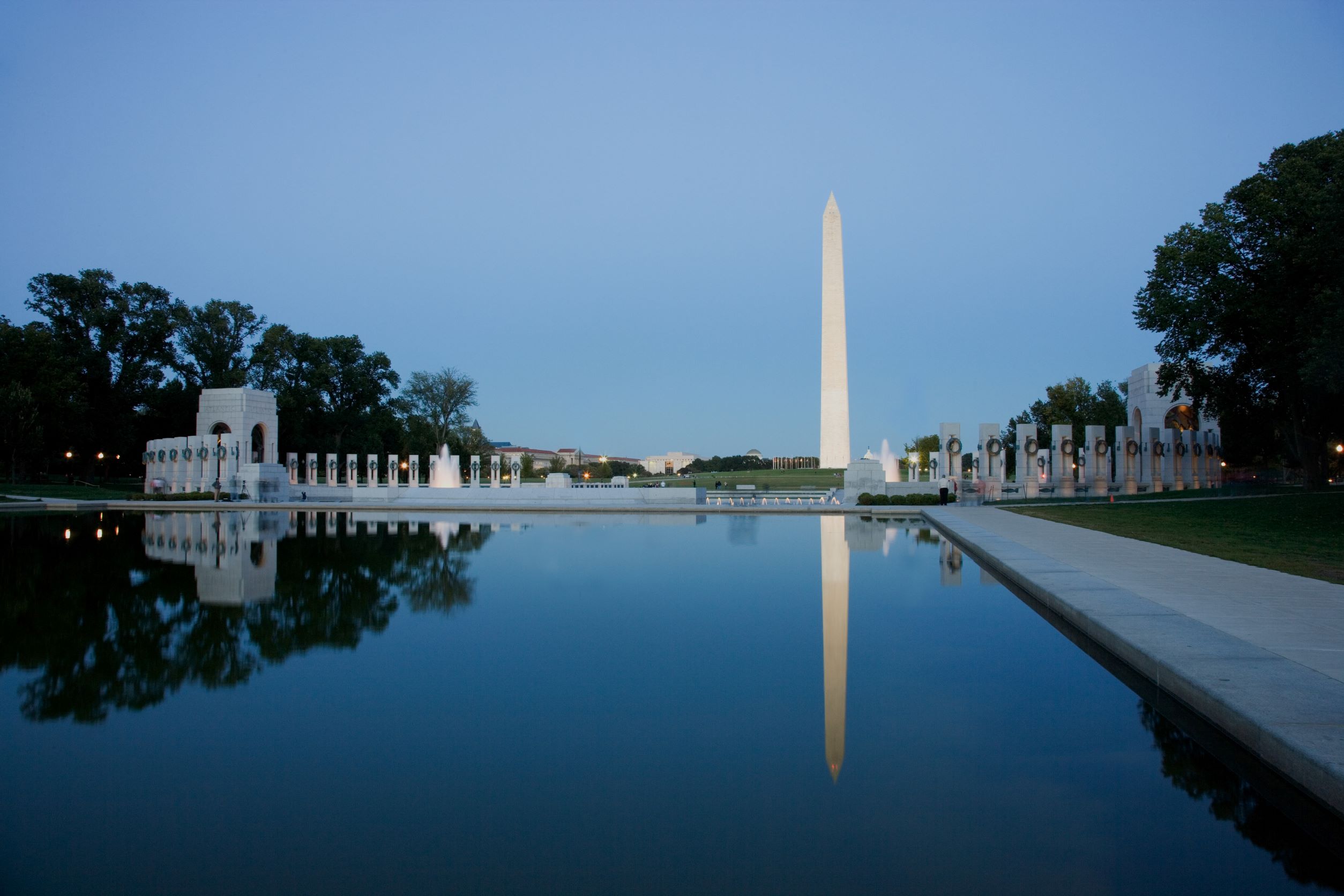 The Washington monument and the reflecting pool at the National Mall in Washington, DC.