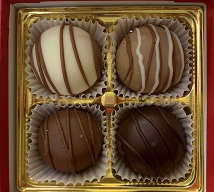 Four assorted chocolates in a box