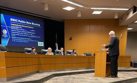 TMP Founder Larry Hill testifying at a HHSC Public Safety Hearing in Texas, advocating for better wages and standards in I/DD care