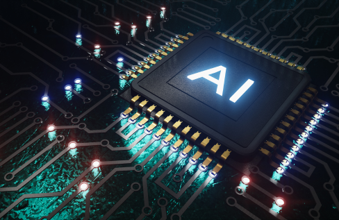 Stock photo of a computer chip on a circuit board with 'AI' on it