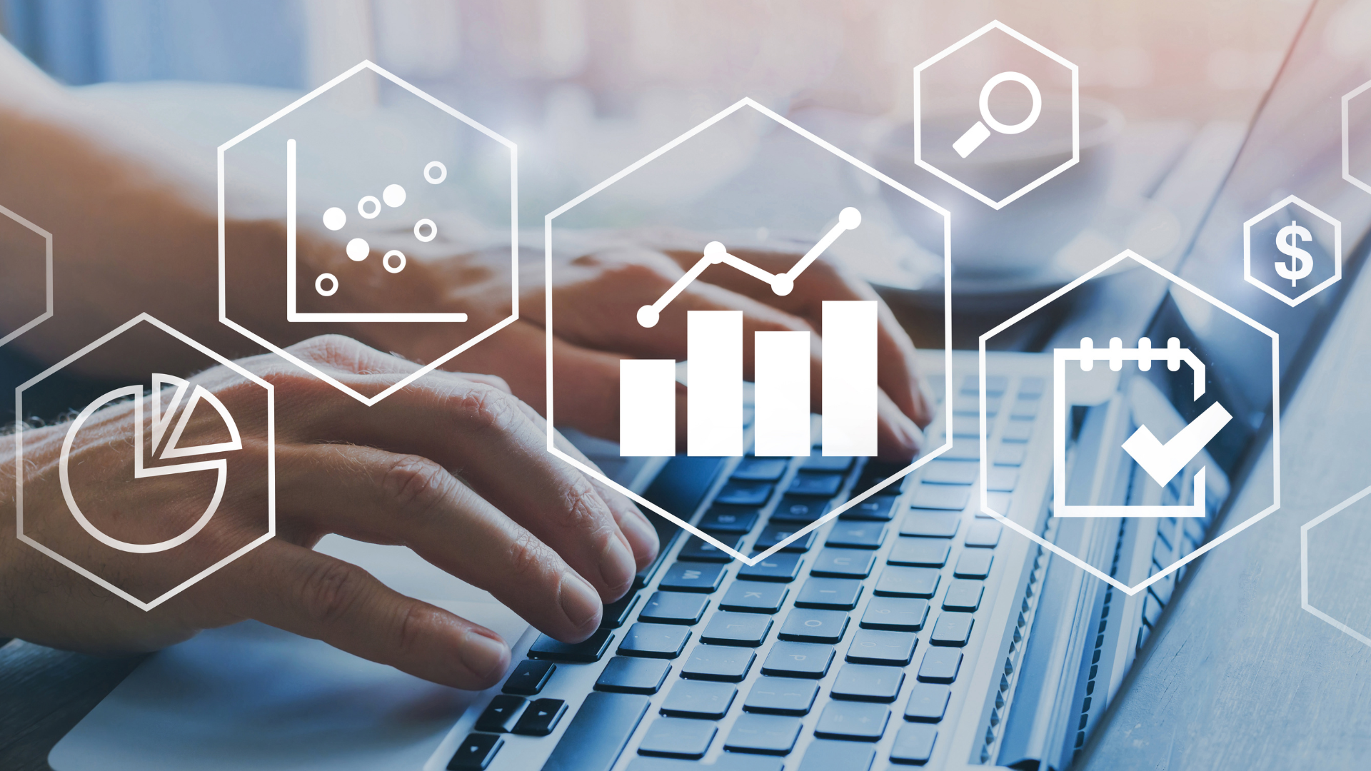 icons of data graphics overlaid across a photo of hands typing at a computer
